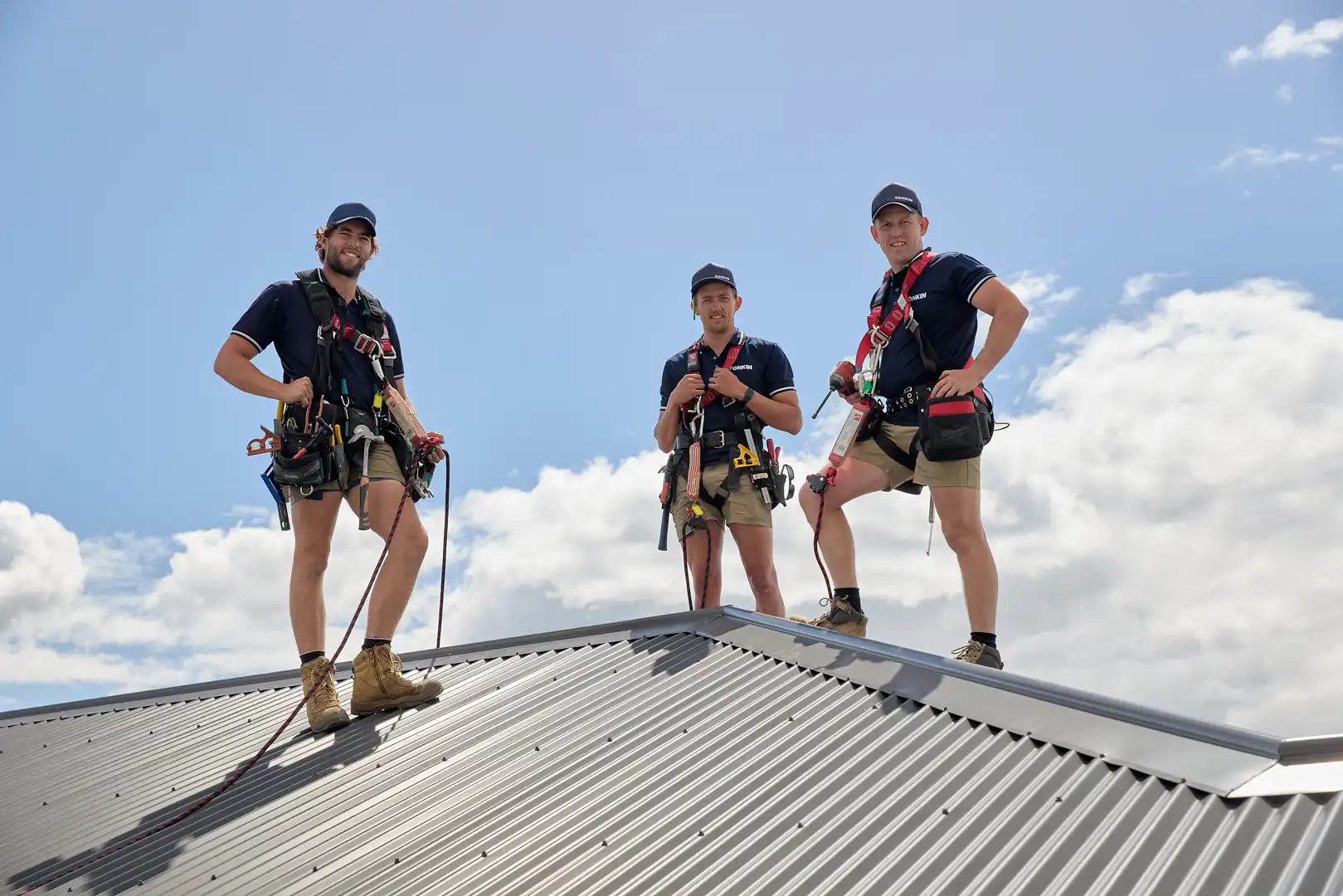 Tradespeople working on a roof